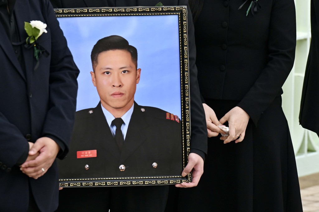 消防處去年12月19日為何偉豪舉行最高榮譽喪禮。資料圖片