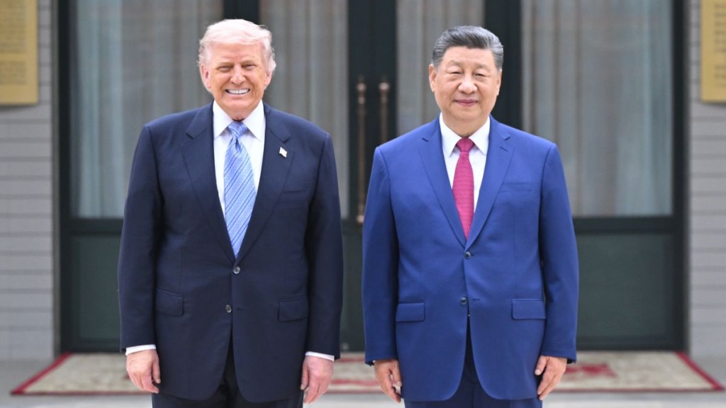 今年5月，访问中国的特朗普与习近平会面。新华社