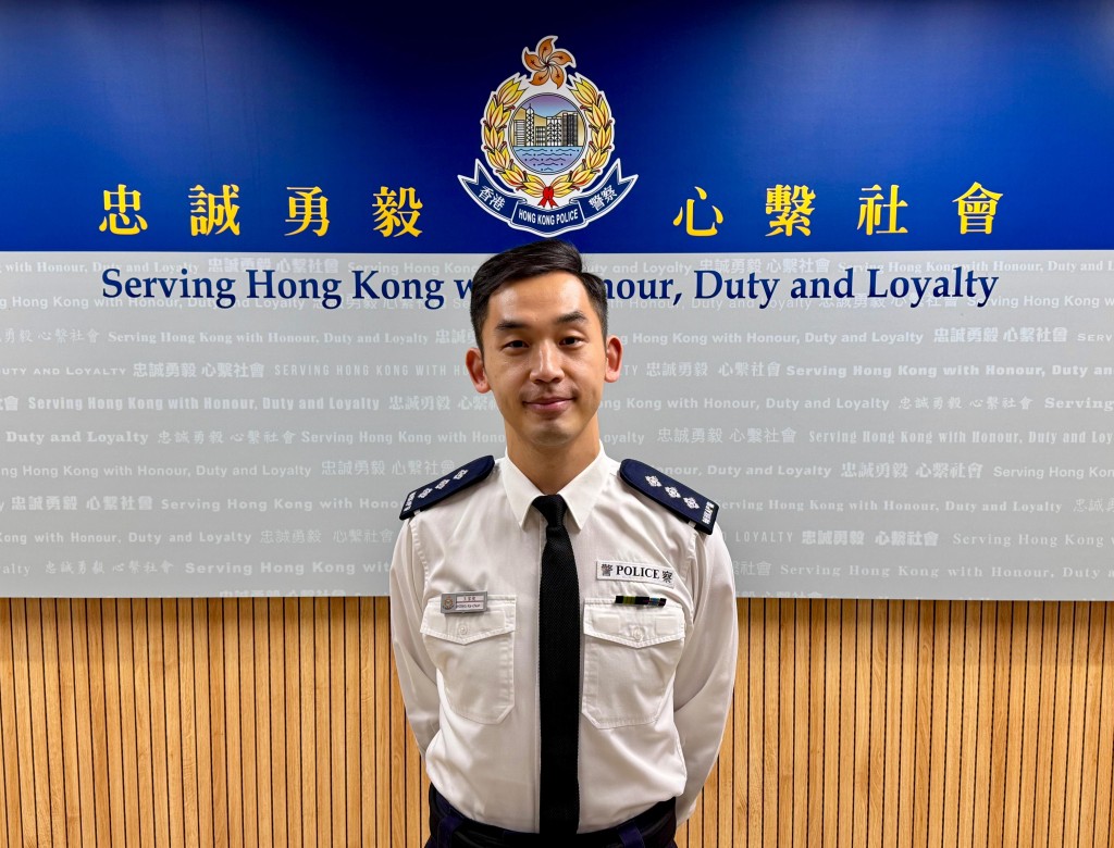柴灣分區助理指揮官(輔警)王家俊，以教師、警察及社工多重身份，引領下一代茁壯成長。 麥鍵瀧攝