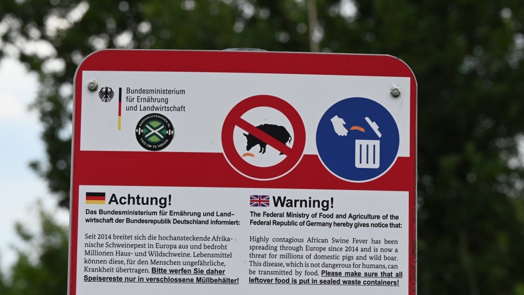德國防治非洲豬瘟傳播的警告牌。 路透社