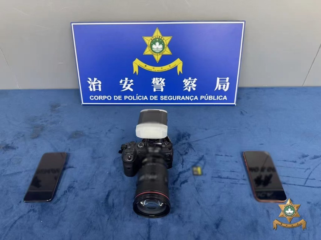 涉案人摄影器材及电话。澳门治安警图片