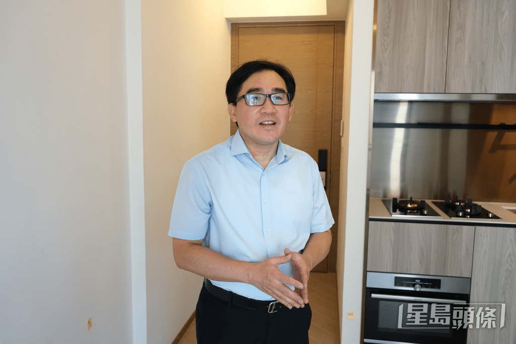 資深驗樓師賴達明。 資深驗樓師賴達明。