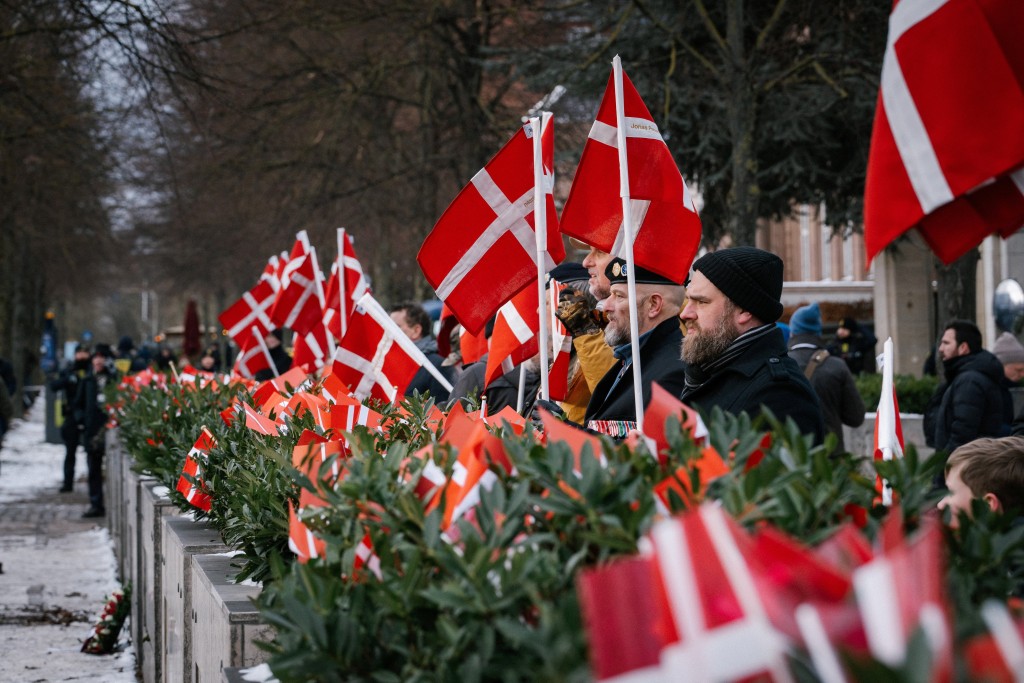示威者回應特朗普政府威脅接管格陵蘭，以及貶低丹麥在國際軍事行動中的貢獻。路透社