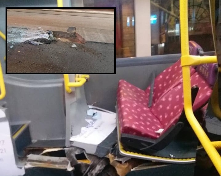 德輔道中近利源東街懷疑因路面損毀,石屎插穿九巴車底。路政署通宵維修路面。網上圖片