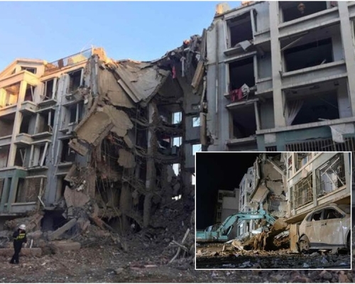 消防員通宵搜救。中新社