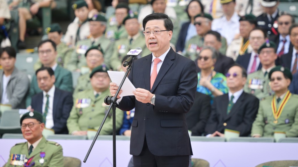 李家超出席香港童軍大會操致辭時,呼籲履行公民責任踴躍投票選出賢能。政府新聞處圖片