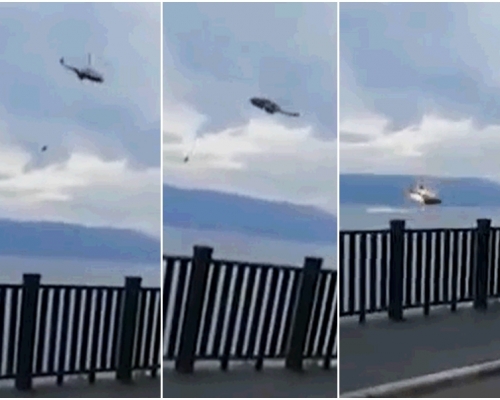 一架用於撲滅灣橋鎮灣橋村大沙壩山山火的直升機在洱海取水時，突然失控墮海。影片截圖
