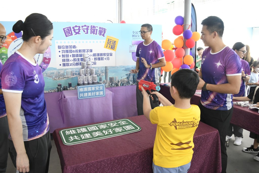 香港懲教學院今日（13日）舉行開放日，現場設有攤位遊戲，以提高大眾的國家安全意識和守法意識。楊偉亨攝