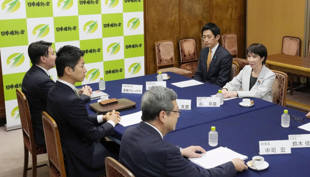 自民黨日前與維新會會談。路透社