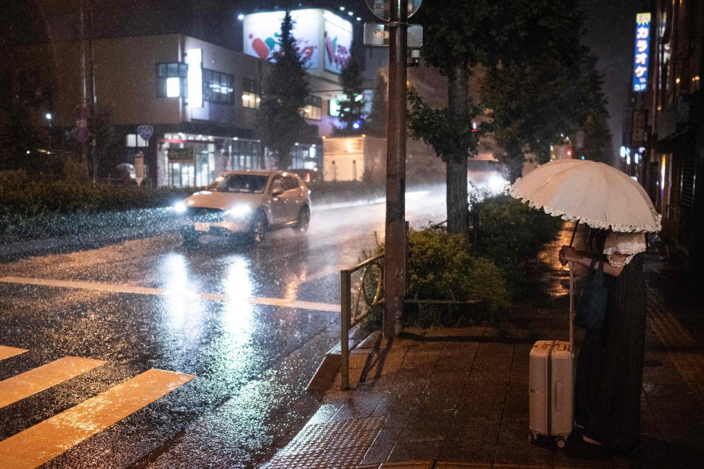 雨勢將持續至周二及周三。法新社 雨勢將持續至周二及周三。法新社