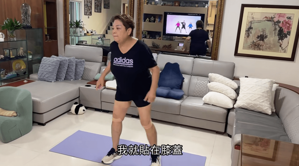 肥媽雙腿貼滿運動膠布做足防護措施，露出纖幼雙腿。