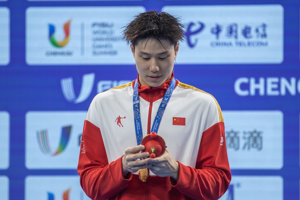 第31屆世界大學生夏季運動會男子200米蛙泳決賽中，中國選手覃海洋以2分08秒09的成績奪得冠軍。 新華社