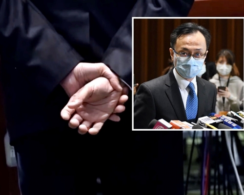 聶德權回答提問期間被記者拍攝到嚴重手震。(港台影片截圖)