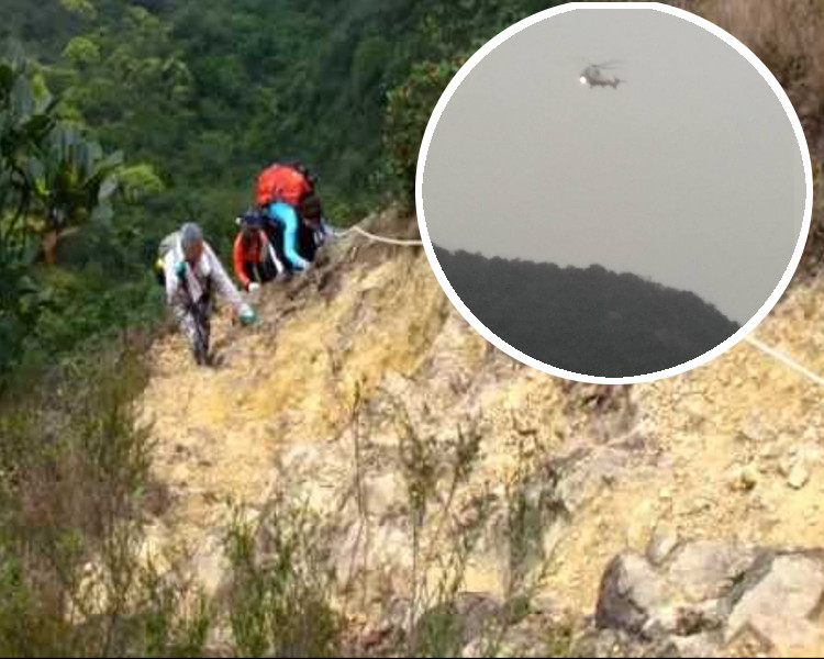 吊手岩山勢險峻，有網民拍到直昇機搜索。網圖
