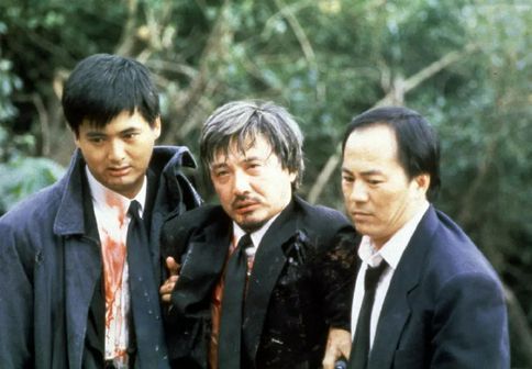 石天有份在《英雄本色II》演出，飾演狄龍恩師。