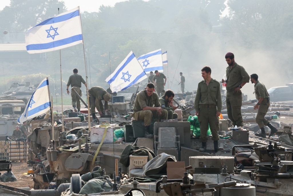 司法改革爭議隨著以色列去年10月遭哈馬斯突襲，之後向加沙展開軍事行動，有關爭議被暫時擱置。路透社