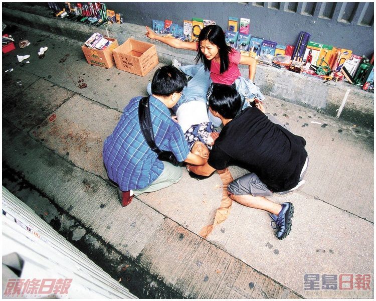 同遇襲女警悲痛震驚﹐向同僚指示槍匪逃走方向。資料圖片