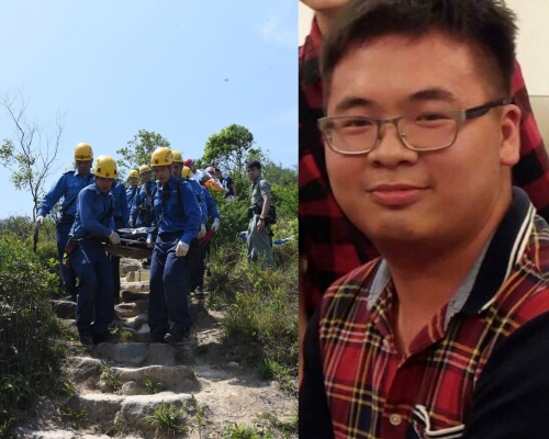 消防將遺體運走。梁國峰攝