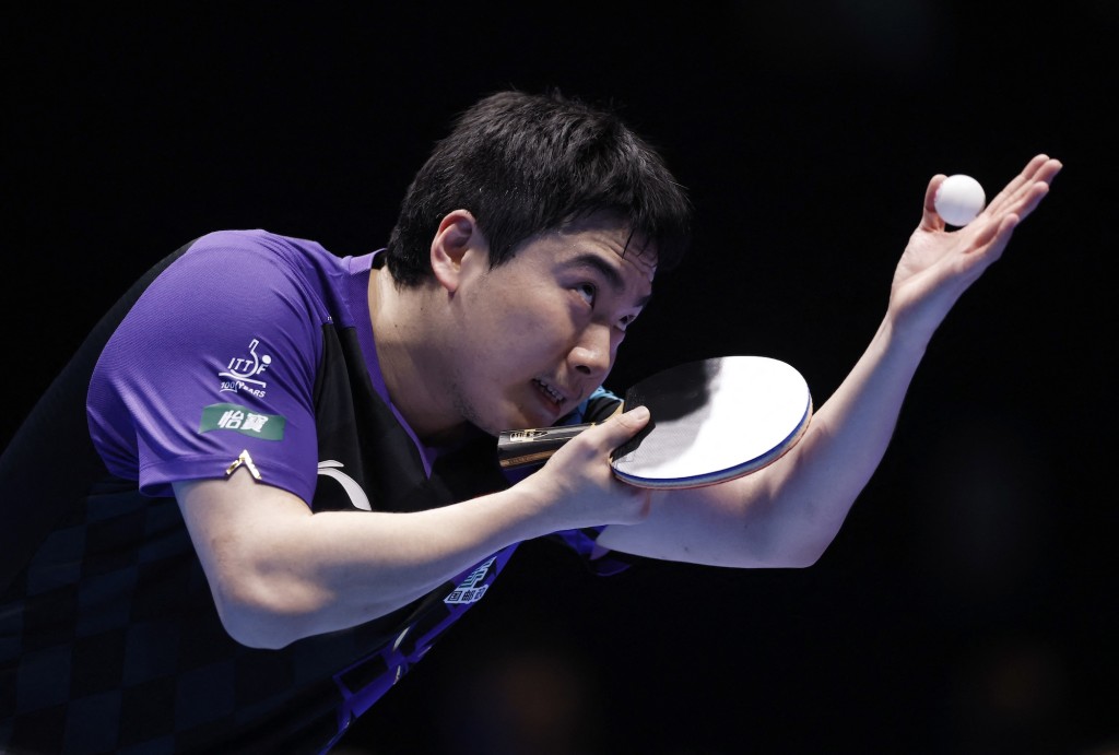 梁靖崑硬撼張本智和，為中國取下關鍵的頭場勝利。路透社