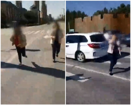 2女竟於大馬路上一路狂追,又對才男瘋狂嘶吼。片段截圖