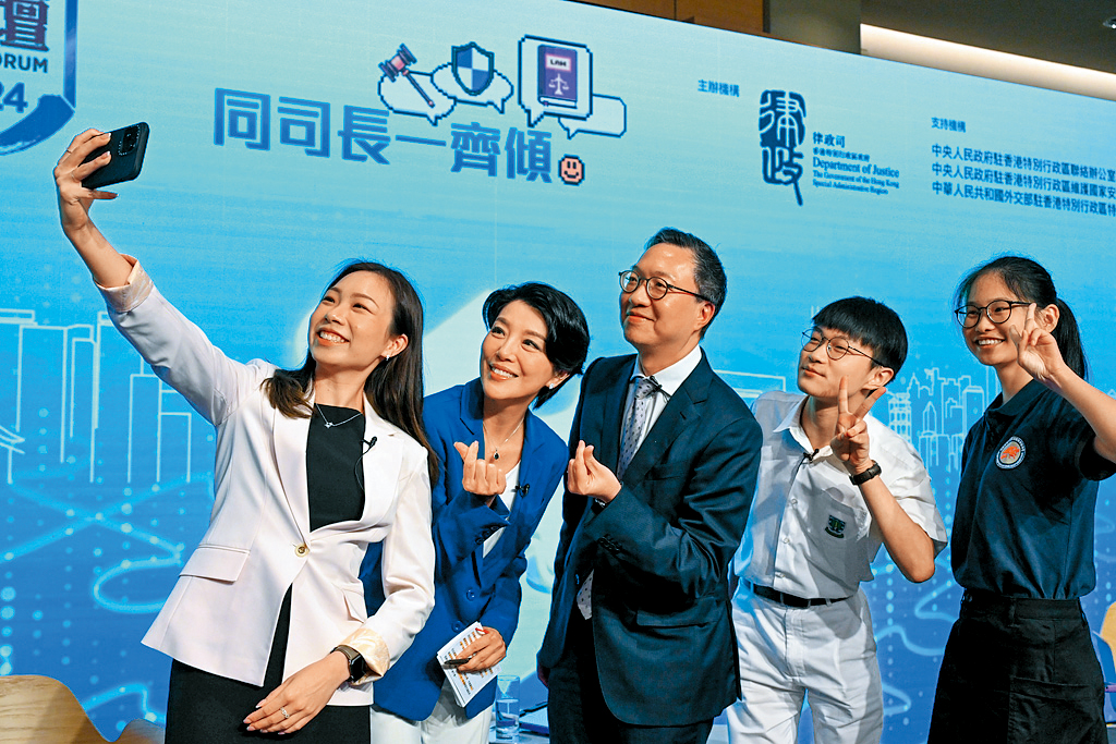 律政司舉辦國安法律論壇2024，與學生及團隊領袖交流。