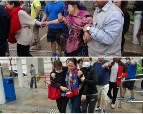 兩名女親友認屍後激動痛哭,由親友攙扶離開。