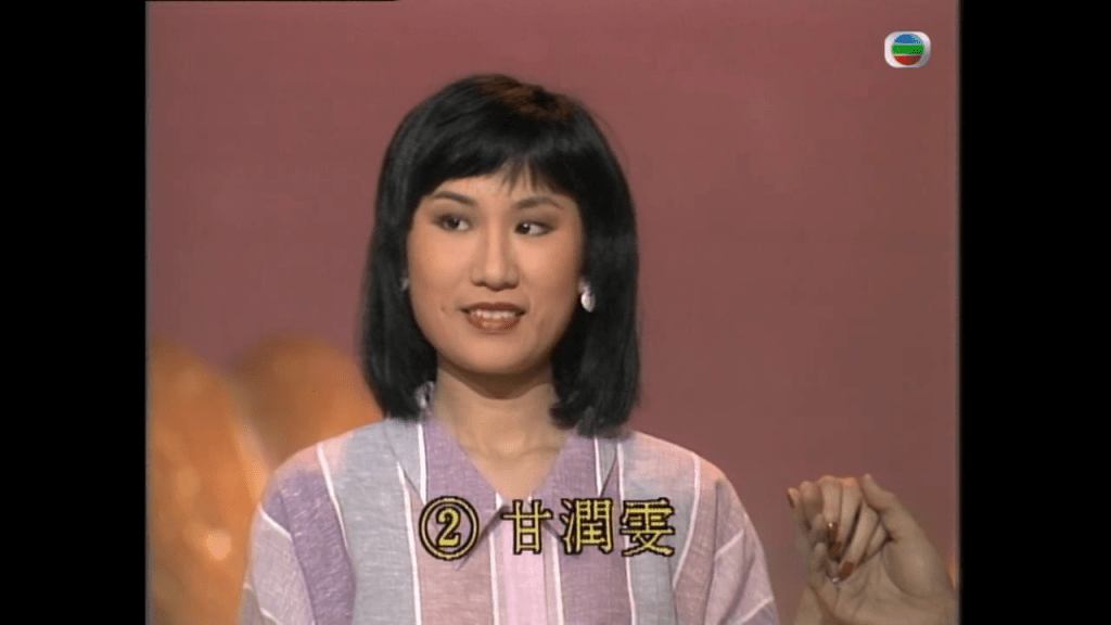 招浩明母親是1984年的落選港姐甘潤雯。