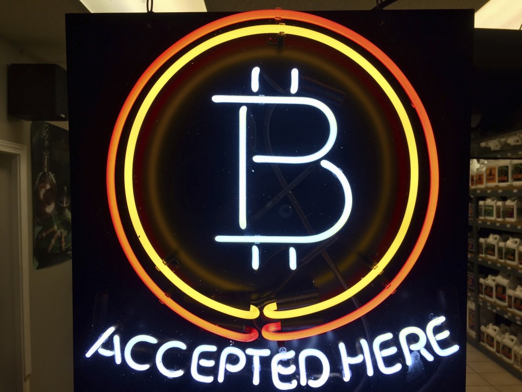 美國有企業接受加密幣。美聯社