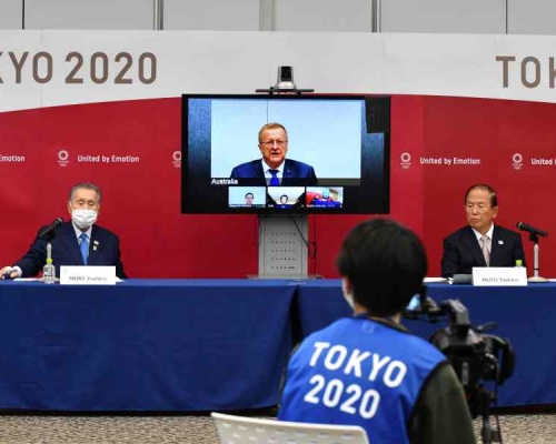 東京奧組委首次有員工確診。AP