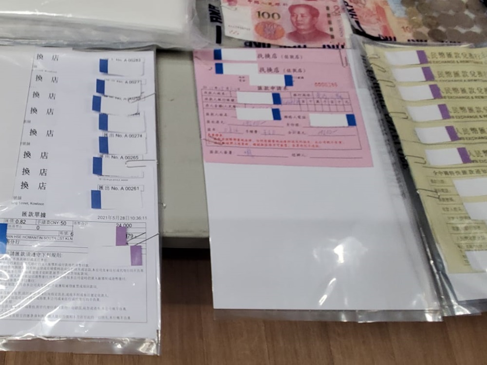 警方檢獲多張匯款收據。