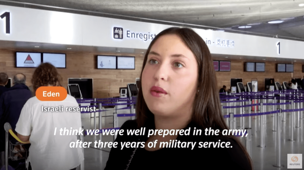 这名以色列女子称准备返国加入后备军行列。路透社
