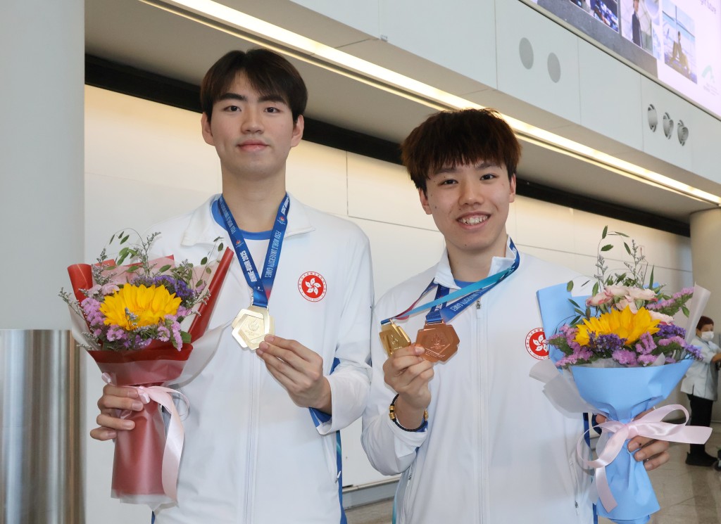 港隊其中一面金牌來自乒球男雙金牌陳顥樺（右）及姚鈞濤(左)。徐嘉華攝