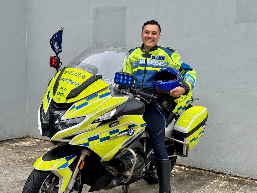 警署警長謝威傑表示，警隊護送組為香港路段的火炬傳遞及跨境自行車賽全程護航。 麥鍵瀧攝