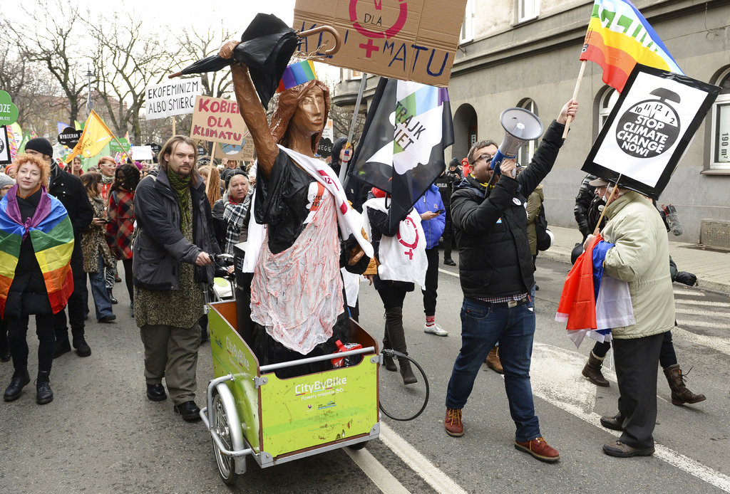 来自不同界别示威者要求制止全球暖化。AP