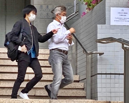 被告梁志安(右)。陳楚琨攝