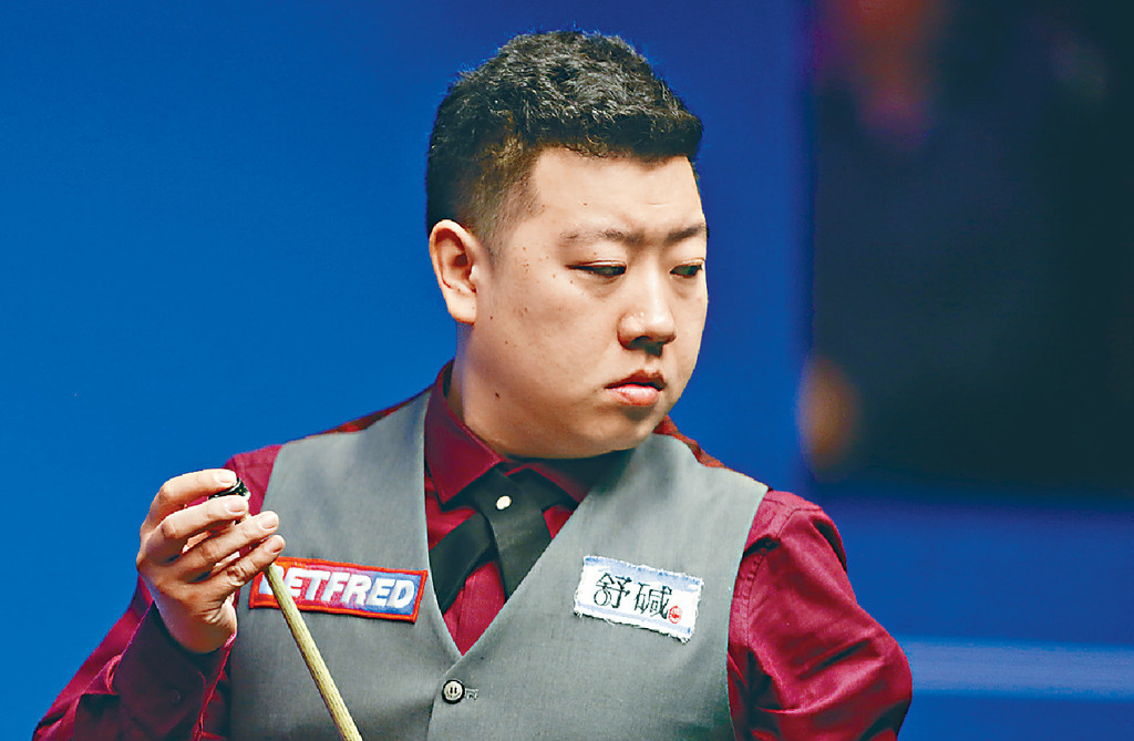 ■中國桌球手李行。