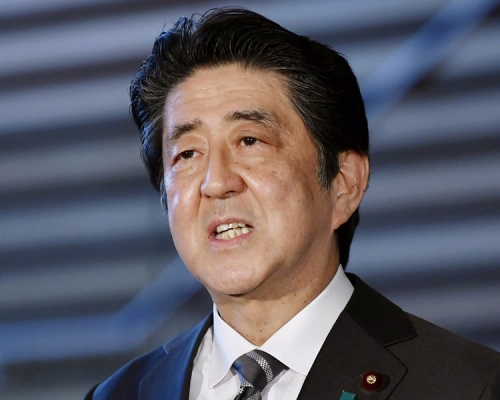 安倍晉三宣布延長全國緊急事態宣言。AP圖