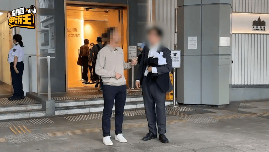 陸先生在庭外與律師商議被申請破產一案。 陸先生在庭外與律師商議被申請破產一案。