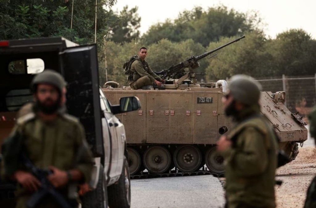 以色列軍隊大舉反擊哈馬斯。路透社