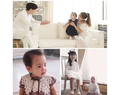 柳真晒家庭照慶細女1歲生, 與家姐露熙一個餅印。IG