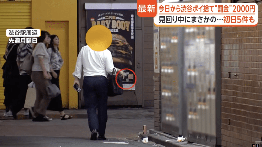 新法令推行的首日,巡邏隊在街頭共當場抓獲10名違規者。 新法令推行的首日,巡邏隊在街頭共當場抓獲10名違規者。