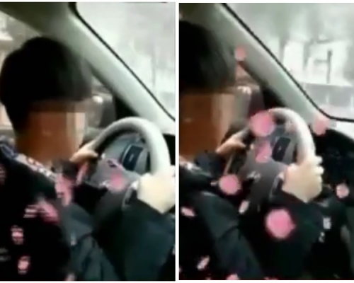 父親教唆11歲兒駕車並自拍視頻。影片截圖