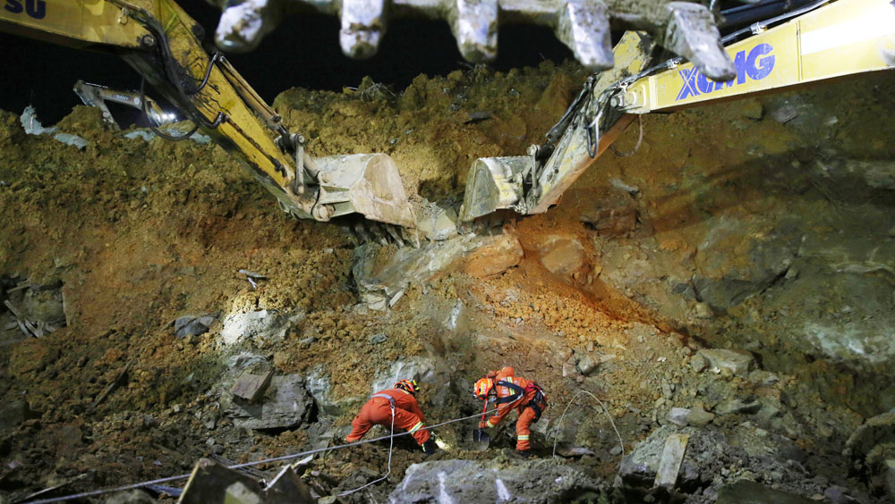 貴州建築地盤山泥傾瀉，增至14人遇難。新華社圖片