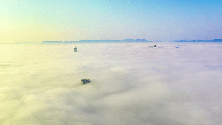 大霧中的福州宛若仙境。人民網