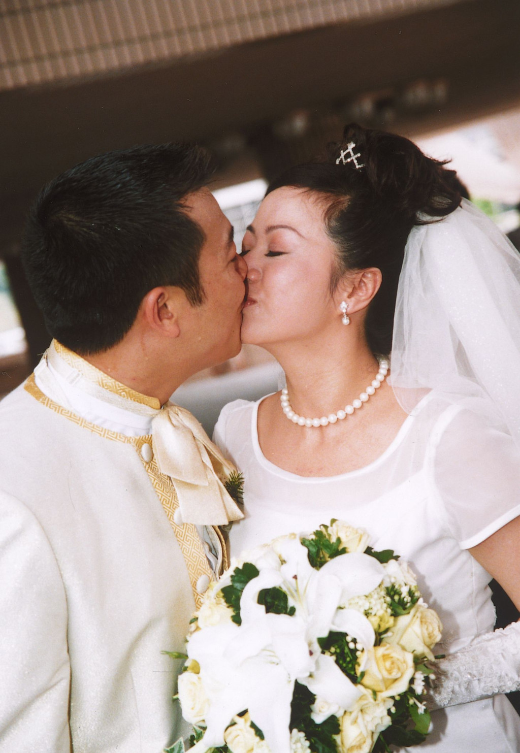 吳毅將於2003年娶唐麗球。