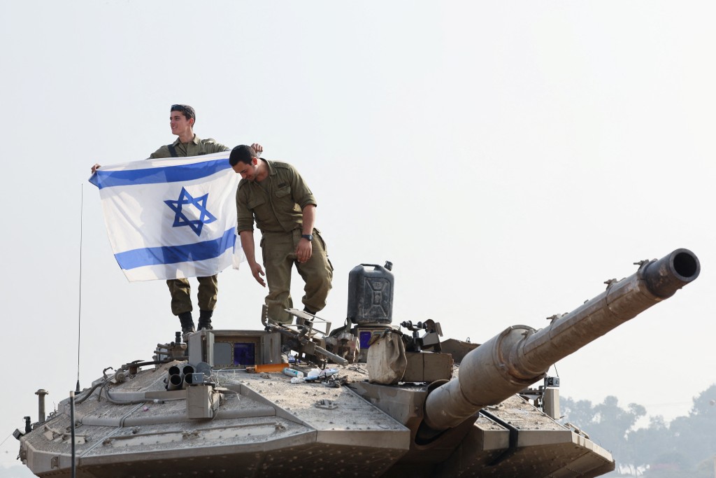 以色列军方指指战斗会持续下去。路透社