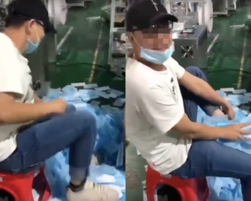 男子用大把口罩擦鞋。影片截圖