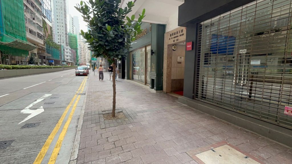 沈振盈於灣仔街頭暈倒，送律敦治醫院搶救後不治。楊偉亨攝