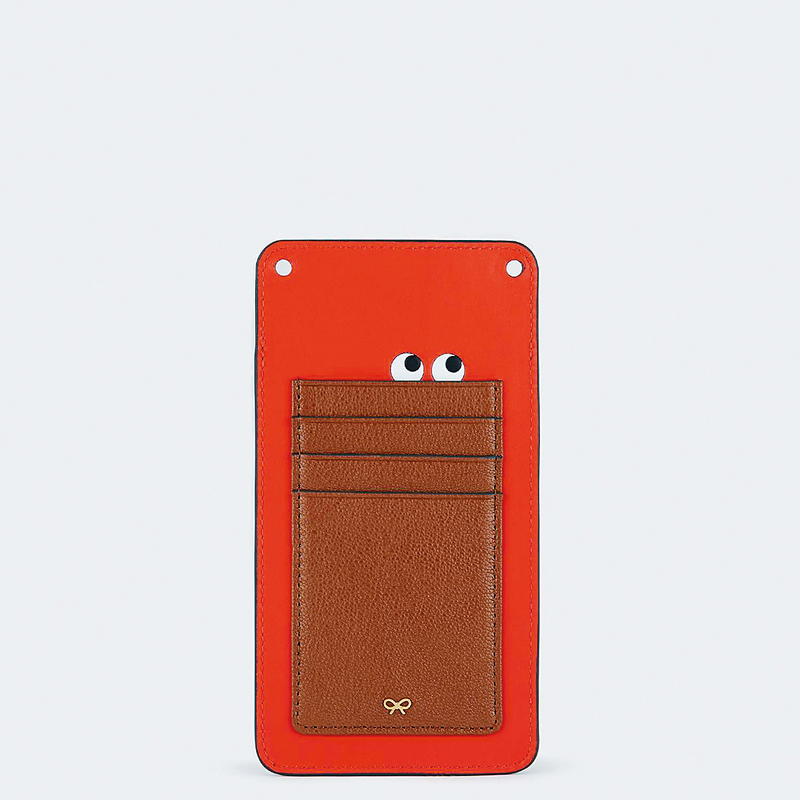 ●啡拼橙色Peeping Eyes图案Phone Pouch， 设有卡片间隔，实用性高，另可挂在身上作装饰。