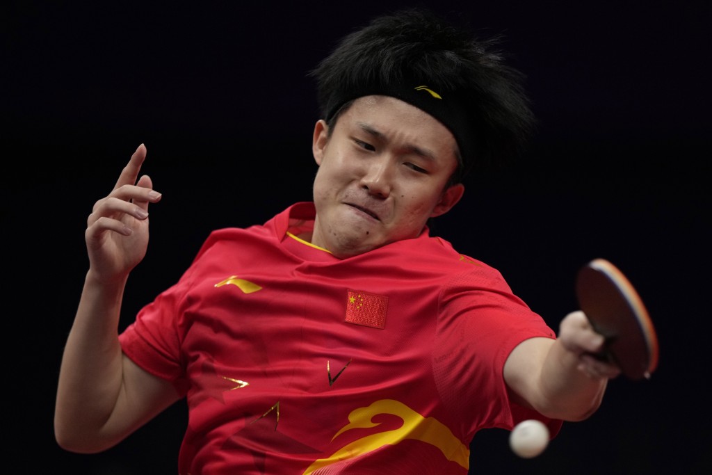 王楚欽是首位男子球員獨攬亞運乒乓球4金。  AP